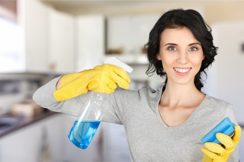 Technician using steam cleaner on carpet